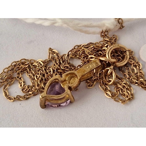 391 - A amethyst pendant on fine chain 9ct 18 inch