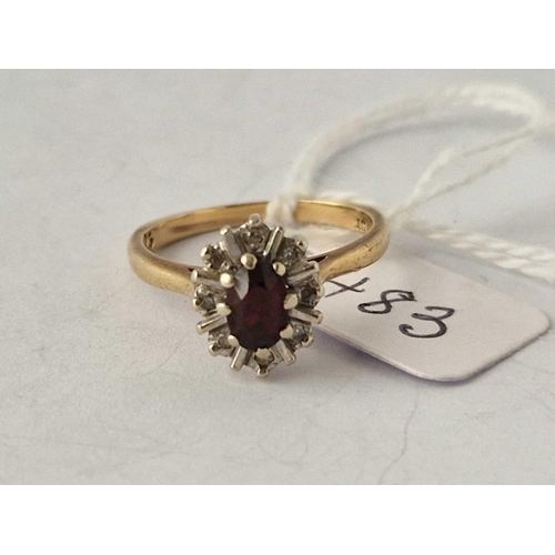 483 - A garnet and diamond dress ring, 9ct, size L 2.7 g