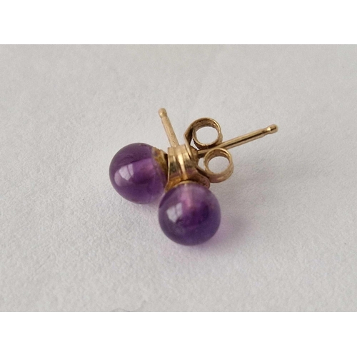 501 - Two pairs of pearl and purple ball ear studs 9ct