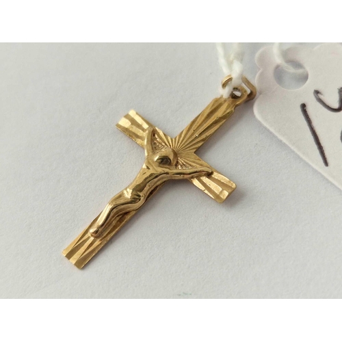 509 - A crucifix pendant 9ct