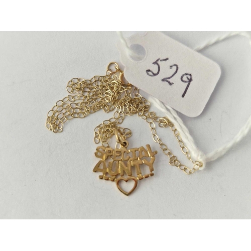 529 - An Special Auntie pendant on chain 9ct 15 inch