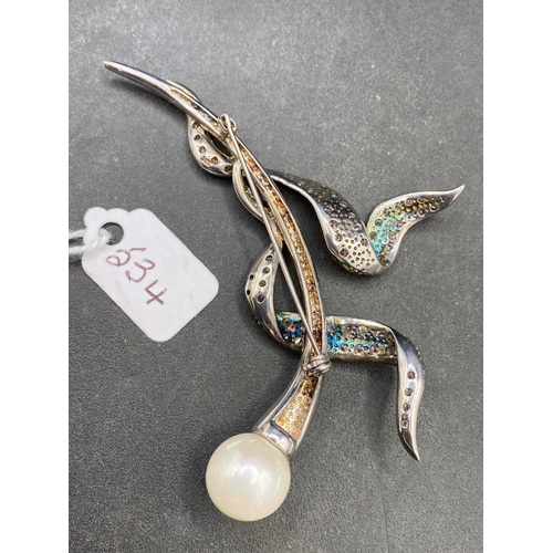 534 - A multi paste and pearl floral brooch set in silver with large single pearl