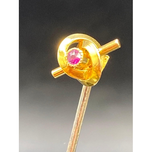 539 - A Gold Ruby Set Lovers Knot Topped Stick Pin 15ct Gold Screw Top