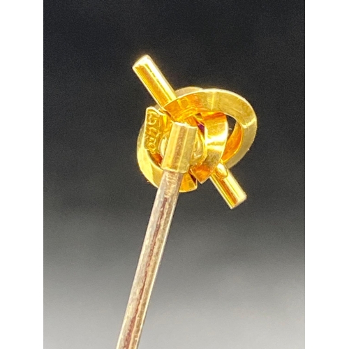 539 - A Gold Ruby Set Lovers Knot Topped Stick Pin 15ct Gold Screw Top