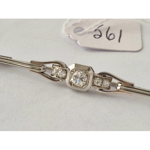 561 - A GOOD ART DECO PLATINUM AND DIAMOND BAR BROOCH WITH FIVE DIAMONDS .50 CARAT 4.8 GMS IN ORIGINAL BOX... 