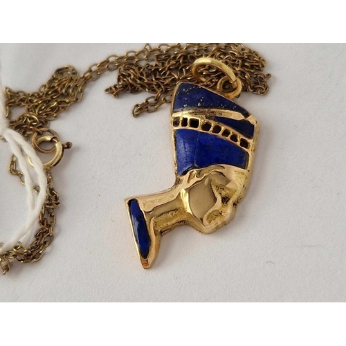 58 - A high carat gold lapis set Egyptian head pendant on 16 inch chain