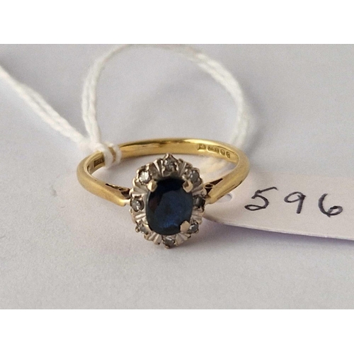 596 - A sapphire and diamond ring, 18ct size M, 3.1 g.