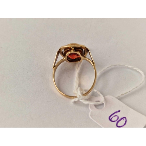 60 - A high carat gold ring set with Hessonite garnet size O 3.6 gms