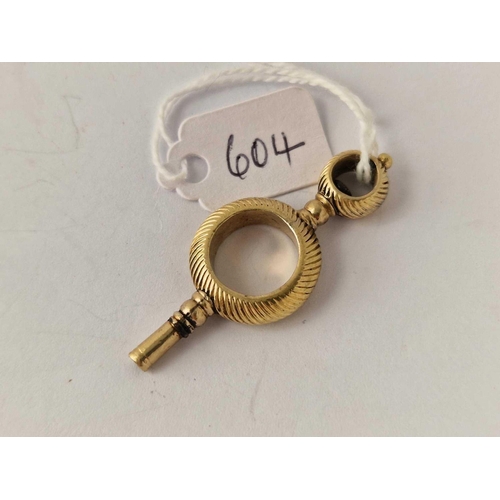 604 - A Georgian watch key 8.3 g.