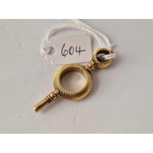 604 - A Georgian watch key 8.3 g.