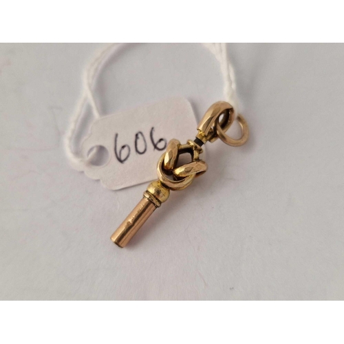 606 - An antique gold top watch key knot style