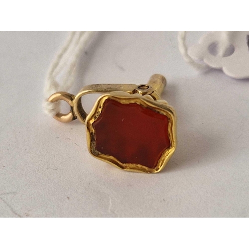 607 - A 19th Century watch fob key with carnelian stone