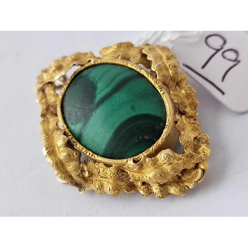 99 - A antique gold mounted malachite brooch 9.7 gms