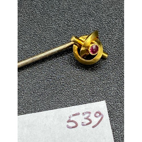 539 - A Gold Ruby Set Lovers Knot Topped Stick Pin 15ct Gold Screw Top