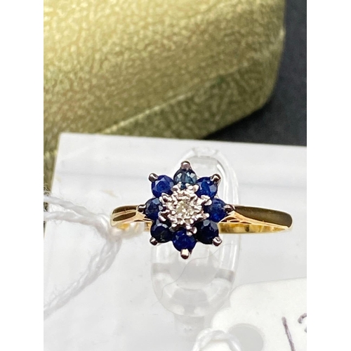 134 - A Diamond And Sapphire Cluster Ring 18Ct Gold Size O 2.4 Gms Boxed