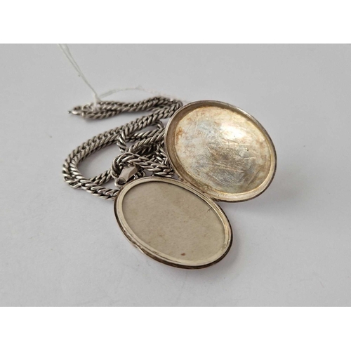 140 - A Silver Locket On Silver Curb Neck Chain Dated 1880