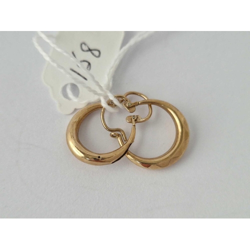 158 - A Pair Of Hoop Earrings 9Ct