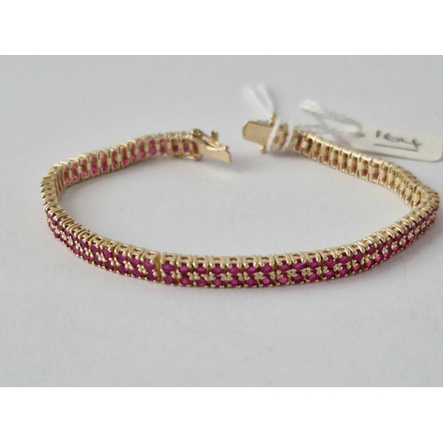 164 - A Attractive Ruby Set Tennis Bracelet 9Ct 7.5 Inches 13.1 Gms Boxed