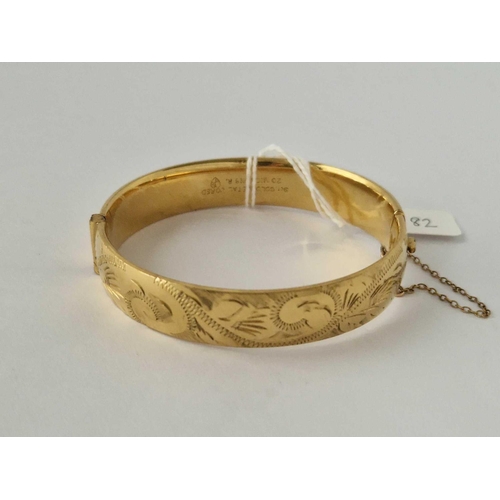 182 - A Rolled Gold Hinged Bangle