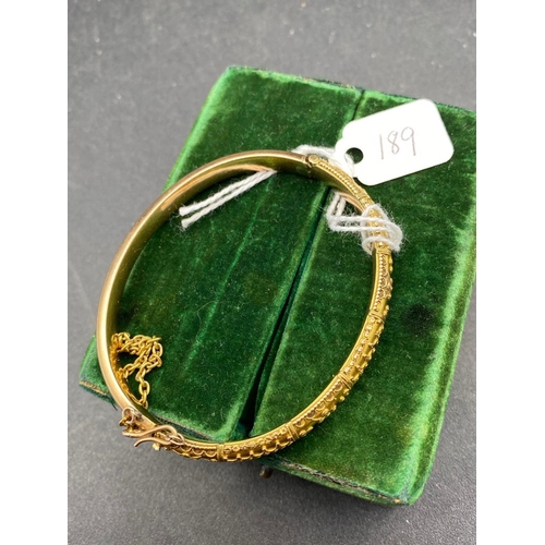 189 - A Good Gold Bangle With Applied Decoration 15Ct Gold Boxed 12.8 Gms