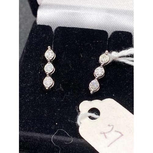 27 - A Pair Of Three Stone Diamond Drop Earrings 9Ct