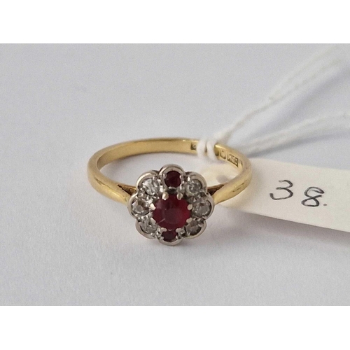 38 - A Ruby And Diamond Cluster Ring 18Ct Gold Size O 3 Gms