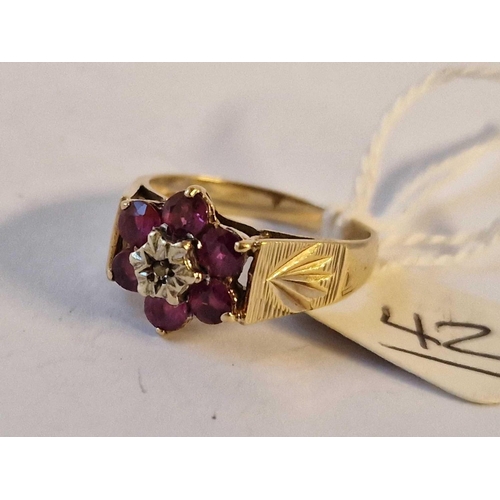 42 - A Diamond And Ruby Cluster Ring 9Ct Size Q 3.6 Gms