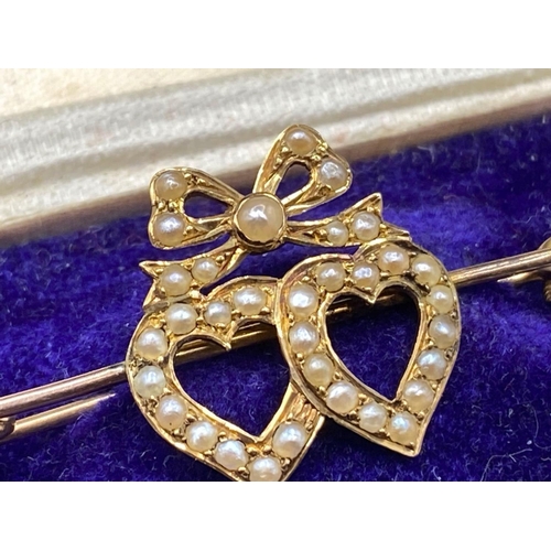 51 - A Victorian High Carat Gold Pearl Set Twin Heart Brooch Boxed