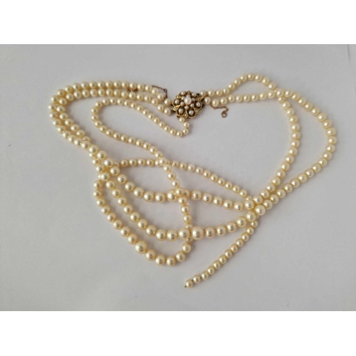 634 - A Pearl Necklace With Large 9Ct Clasp