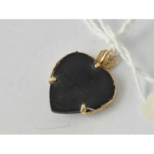 637 - An Onyx Heart Pendant, 14Ct