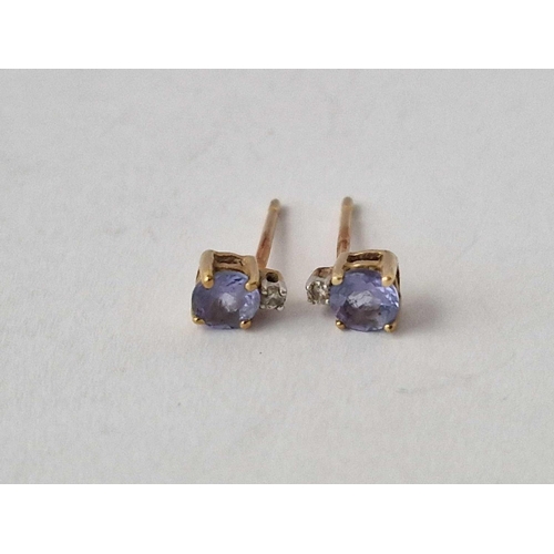 639 - A Pair Of Tanzanite Diamond Earrings, 9Ct