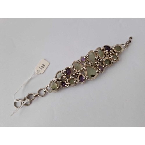 648 - A Large Silver Multi Stone Set Bracelet