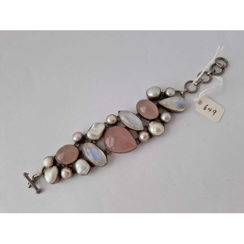 649 - A Large Silver Multi Stone Set Bracelet