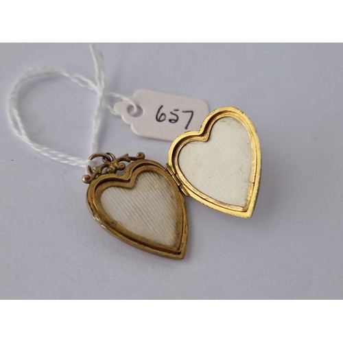 657 - A Gold Back And Front Heart Locket With Garnet And Pearls