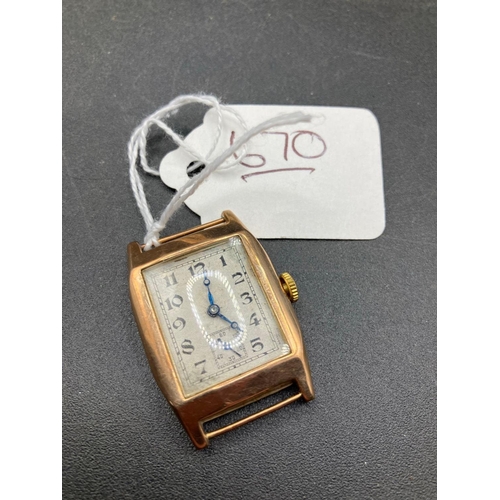 670 - A Oblong Art Deco Gold Wrist Watch With No Strap