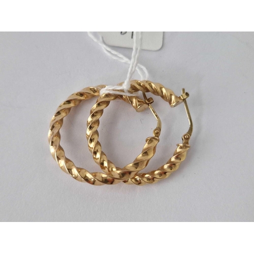 81 - A Pair Of Large Hoop Earrings 9Ct 2.9 Gms