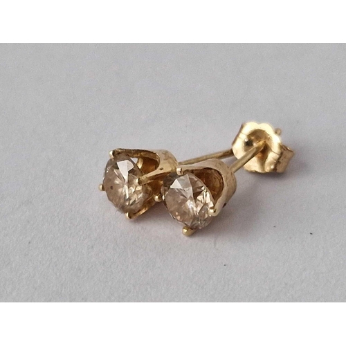 85 - A Pair Of Gold Mounted Diamond Ear Studs