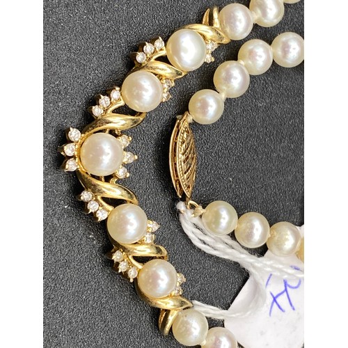 64 - A Fine Diamond And Pearl 14Ct Gold Necklace 19.3G