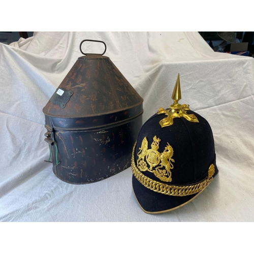 1702 - A Prussian Helmet In A Metal Box