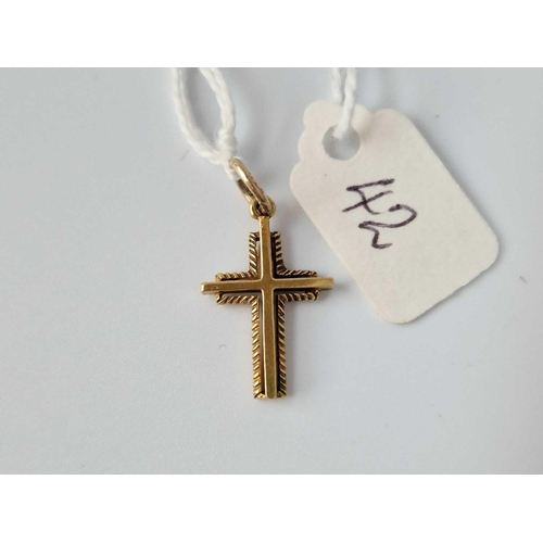 42 - A 9Ct Cross 1.3 Gms