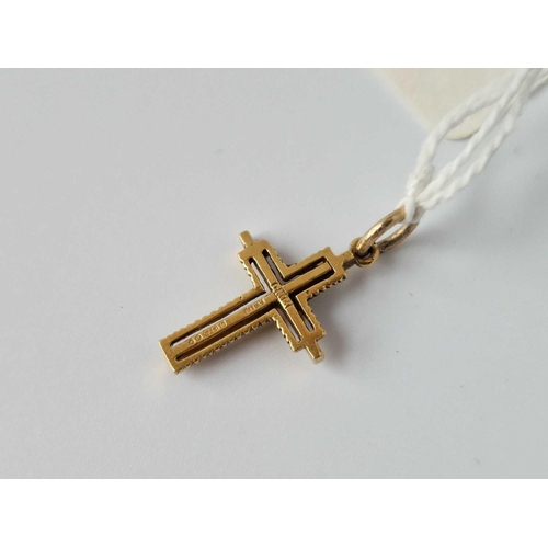 42 - A 9Ct Cross 1.3 Gms