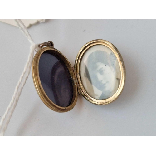 58 - A Victorian Gold Back And Front Enamel Mizpah Locket