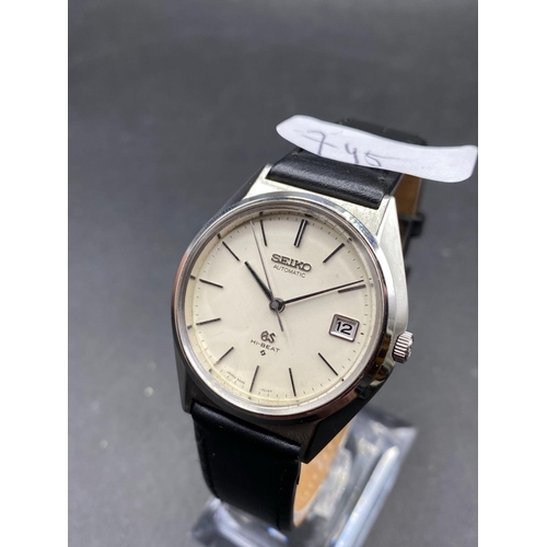 745 - A Grand Seiko Gents Wrist Watch with Date Aperture, W/O Recently Serviced Model 5645-7010