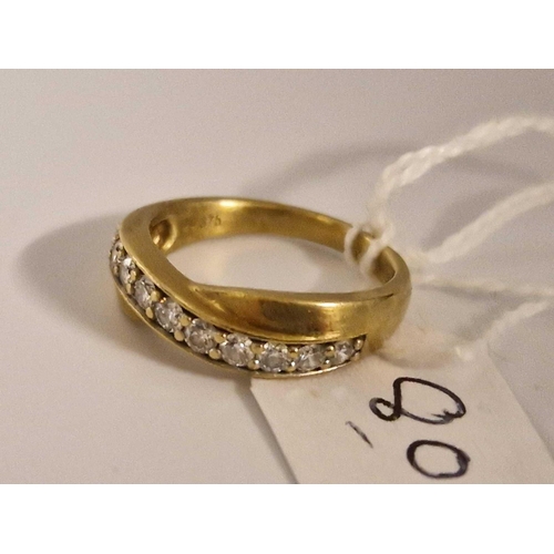 80 - An 11 Stone Curved Diamond 9Ct Ring Size M 3.2G