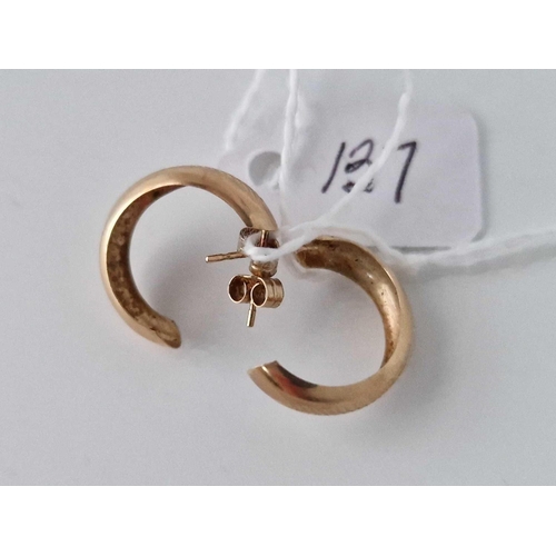 137 - A Pair Of Half Hoop Earrings 9Ct