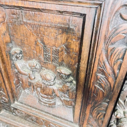 1778 - Decorative 19th C Long Cased Clock In A Heavily Carved Oak Case The Arched Top With Numerous Bells