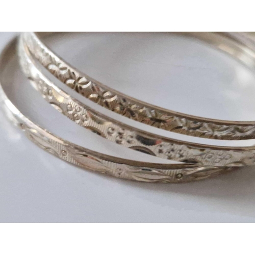 212 - Three Silver Bangle