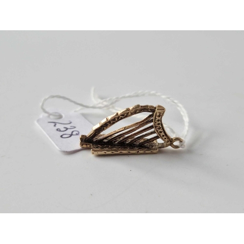 238 - A Novelty Pendant In The Form Of A Harp 9Ct 3.1 Gms