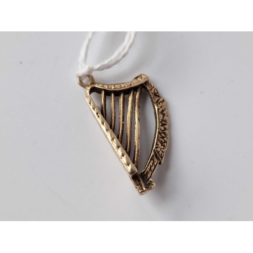 238 - A Novelty Pendant In The Form Of A Harp 9Ct 3.1 Gms