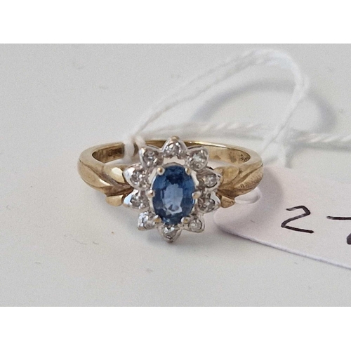 27 - A Oval Sapphire And Diamond Cluster Ring 9Ct Size N